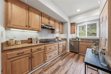 Perched high on a quiet hilltop at 19429 Moon Ridge in Hidden on Hidden Valley Lake Golf and Country Club in California - for sale on GolfHomes.com, golf home, golf lot