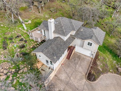 Perched high on a quiet hilltop at 19429 Moon Ridge in Hidden on Hidden Valley Lake Golf and Country Club in California - for sale on GolfHomes.com, golf home, golf lot