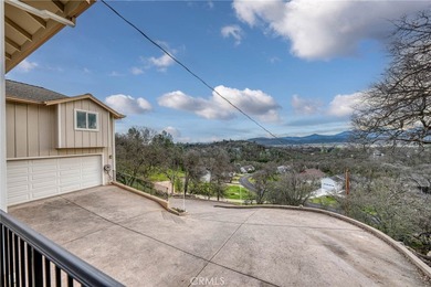 Perched high on a quiet hilltop at 19429 Moon Ridge in Hidden on Hidden Valley Lake Golf and Country Club in California - for sale on GolfHomes.com, golf home, golf lot