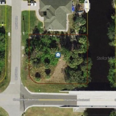 Captivating Waterfront Lot in Port Charlotte! Nestled in a on Sabal Trace Golf and Country Club in Florida - for sale on GolfHomes.com, golf home, golf lot