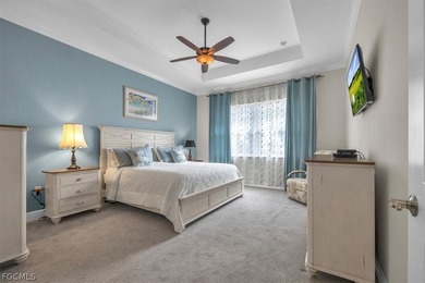 This exquisite home is situated in the award-winning Pelican on Pelican Preserve Golf Club in Florida - for sale on GolfHomes.com, golf home, golf lot