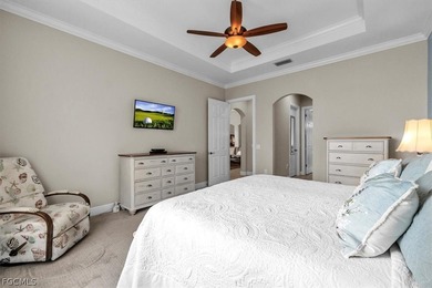 This exquisite home is situated in the award-winning Pelican on Pelican Preserve Golf Club in Florida - for sale on GolfHomes.com, golf home, golf lot