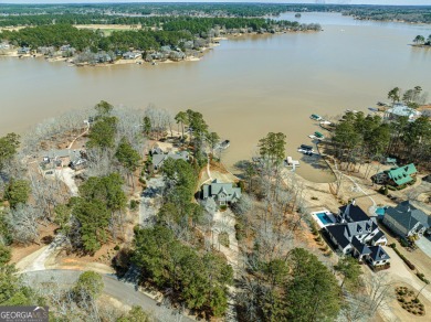 Luxury Lakefront living on Lake Oconee. Located in the gated on The Golf Club at Cuscowilla in Georgia - for sale on GolfHomes.com, golf home, golf lot