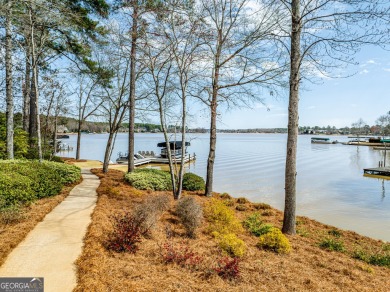 Luxury Lakefront living on Lake Oconee. Located in the gated on The Golf Club at Cuscowilla in Georgia - for sale on GolfHomes.com, golf home, golf lot