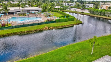 Welcome to your first floor water view unit at Saxony A in the on Addison Reserve in Florida - for sale on GolfHomes.com, golf home, golf lot