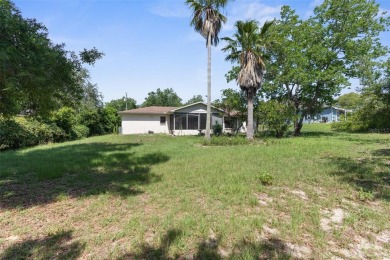 Under contract-accepting backup offers. INVESTOR SPECIAL. Great on Spring Hill Golf Course in Florida - for sale on GolfHomes.com, golf home, golf lot