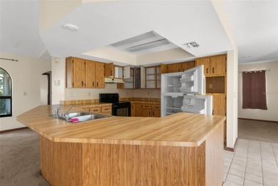 Under contract-accepting backup offers. INVESTOR SPECIAL. Great on Spring Hill Golf Course in Florida - for sale on GolfHomes.com, golf home, golf lot