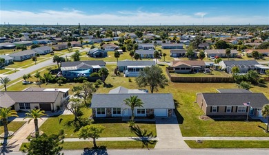 Welcome to your beautifully updated Florida retreat in the on Duffys Golf Center in Florida - for sale on GolfHomes.com, golf home, golf lot
