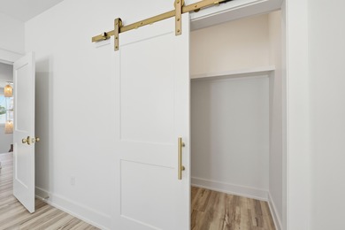 Welcome to your coastal retreat! This stunning 2025 new on Sharks Tooth Golf Club in Florida - for sale on GolfHomes.com, golf home, golf lot