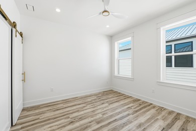 Welcome to your coastal retreat! This stunning 2025 new on Sharks Tooth Golf Club in Florida - for sale on GolfHomes.com, golf home, golf lot