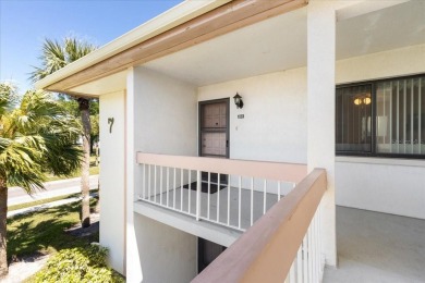 Immaculately Maintained 2-Bedroom Condo with Serene Pond Views on East Lake Woodlands Country Club in Florida - for sale on GolfHomes.com, golf home, golf lot