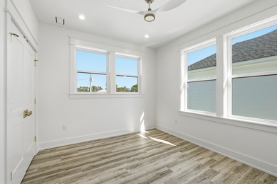 Welcome to your coastal retreat! This stunning 2025 new on Sharks Tooth Golf Club in Florida - for sale on GolfHomes.com, golf home, golf lot