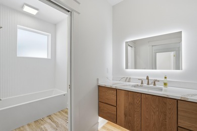 Welcome to your coastal retreat! This stunning 2025 new on Sharks Tooth Golf Club in Florida - for sale on GolfHomes.com, golf home, golf lot