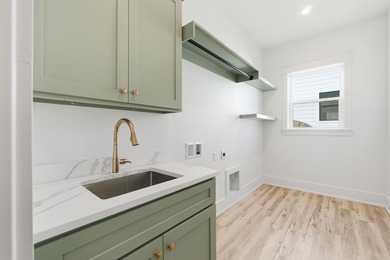 Welcome to your coastal retreat! This stunning 2025 new on Sharks Tooth Golf Club in Florida - for sale on GolfHomes.com, golf home, golf lot