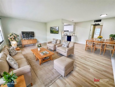 Welcome to a beautifully renovated apartment in the community of on Wynmoor Golf Course in Florida - for sale on GolfHomes.com, golf home, golf lot