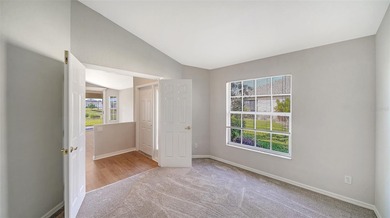 Located in the secure, private gated community of Sabal Trace on Sabal Trace Golf and Country Club in Florida - for sale on GolfHomes.com, golf home, golf lot