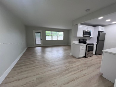 Welcome to a beautifully renovated apartment in the community of on Wynmoor Golf Course in Florida - for sale on GolfHomes.com, golf home, golf lot