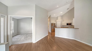 Located in the secure, private gated community of Sabal Trace on Sabal Trace Golf and Country Club in Florida - for sale on GolfHomes.com, golf home, golf lot