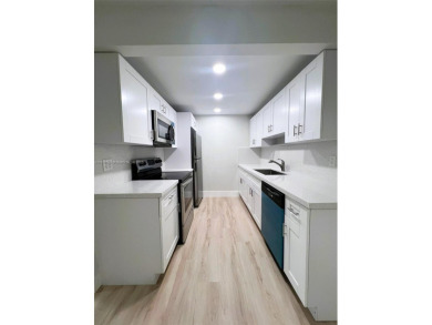 Welcome to a beautifully renovated apartment in the community of on Wynmoor Golf Course in Florida - for sale on GolfHomes.com, golf home, golf lot