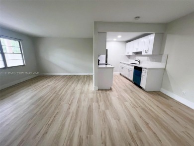 Welcome to a beautifully renovated apartment in the community of on Wynmoor Golf Course in Florida - for sale on GolfHomes.com, golf home, golf lot