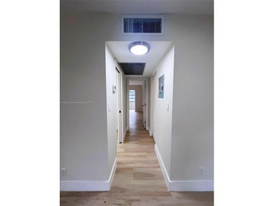 Welcome to a beautifully renovated apartment in the community of on Wynmoor Golf Course in Florida - for sale on GolfHomes.com, golf home, golf lot