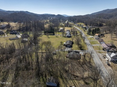 Explore this captivating lot along Buffalo Creek, an ideal site on Buffalo Valley Golf Course in Tennessee - for sale on GolfHomes.com, golf home, golf lot