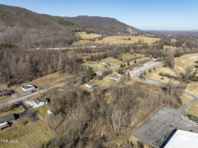 Explore this captivating lot along Buffalo Creek, an ideal site on Buffalo Valley Golf Course in Tennessee - for sale on GolfHomes.com, golf home, golf lot