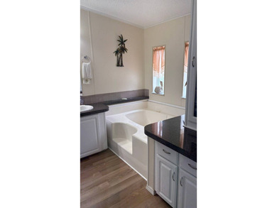 At The Heritage, one of Southwest Florida's premier 55+ gated on Sabal Springs Golf and Racquet Club in Florida - for sale on GolfHomes.com, golf home, golf lot