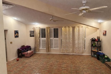 Beautiful home on quiet cul-de-sac on Diamondhead's Pines Golf on Diamondhead Country Club in Mississippi - for sale on GolfHomes.com, golf home, golf lot