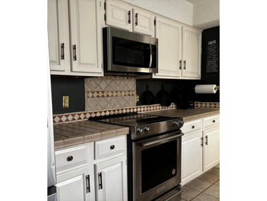 Beautiful home on quiet cul-de-sac on Diamondhead's Pines Golf on Diamondhead Country Club in Mississippi - for sale on GolfHomes.com, golf home, golf lot