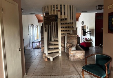 Beautiful home on quiet cul-de-sac on Diamondhead's Pines Golf on Diamondhead Country Club in Mississippi - for sale on GolfHomes.com, golf home, golf lot