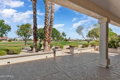 Discover this popular Palo Verde model nestled on the 7th green on Sun City Grand Golf Couse and Club in Arizona - for sale on GolfHomes.com, golf home, golf lot