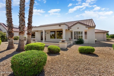 Discover this popular Palo Verde model nestled on the 7th green on Sun City Grand Golf Couse and Club in Arizona - for sale on GolfHomes.com, golf home, golf lot