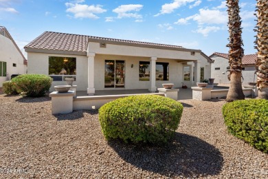 Discover this popular Palo Verde model nestled on the 7th green on Sun City Grand Golf Couse and Club in Arizona - for sale on GolfHomes.com, golf home, golf lot