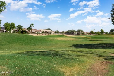 Discover this popular Palo Verde model nestled on the 7th green on Sun City Grand Golf Couse and Club in Arizona - for sale on GolfHomes.com, golf home, golf lot