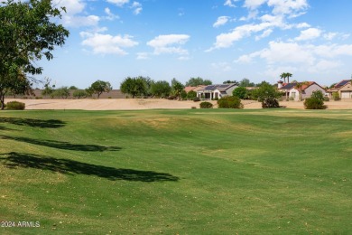 Discover this popular Palo Verde model nestled on the 7th green on Sun City Grand Golf Couse and Club in Arizona - for sale on GolfHomes.com, golf home, golf lot