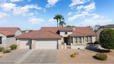 Discover this popular Palo Verde model nestled on the 7th green on Sun City Grand Golf Couse and Club in Arizona - for sale on GolfHomes.com, golf home, golf lot