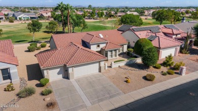 Discover this popular Palo Verde model nestled on the 7th green on Sun City Grand Golf Couse and Club in Arizona - for sale on GolfHomes.com, golf home, golf lot