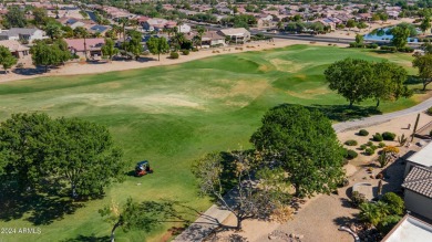 Discover this popular Palo Verde model nestled on the 7th green on Sun City Grand Golf Couse and Club in Arizona - for sale on GolfHomes.com, golf home, golf lot