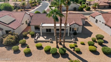 Discover this popular Palo Verde model nestled on the 7th green on Sun City Grand Golf Couse and Club in Arizona - for sale on GolfHomes.com, golf home, golf lot