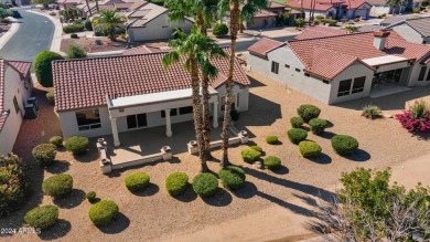 Discover this popular Palo Verde model nestled on the 7th green on Sun City Grand Golf Couse and Club in Arizona - for sale on GolfHomes.com, golf home, golf lot