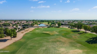 Discover this popular Palo Verde model nestled on the 7th green on Sun City Grand Golf Couse and Club in Arizona - for sale on GolfHomes.com, golf home, golf lot