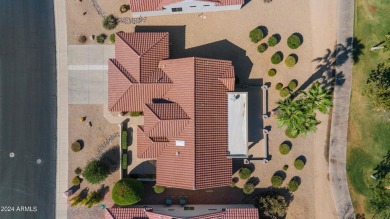 Discover this popular Palo Verde model nestled on the 7th green on Sun City Grand Golf Couse and Club in Arizona - for sale on GolfHomes.com, golf home, golf lot