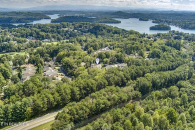 It FEELS LIKE HOME as soon as you open the front door. OPEN on Toqua Golf Course - Loudon County in Tennessee - for sale on GolfHomes.com, golf home, golf lot