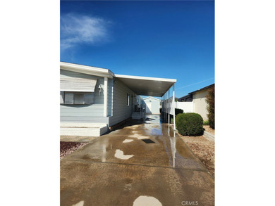 Charming Golf Knolls manufactured home on permanent foundation on The Golf Club At Rancho California in California - for sale on GolfHomes.com, golf home, golf lot