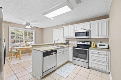 This thoughtfully designed 4-bedroom, 3-bathroom all-brick home on Moores Mill Golf Club in Alabama - for sale on GolfHomes.com, golf home, golf lot