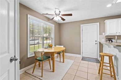 This thoughtfully designed 4-bedroom, 3-bathroom all-brick home on Moores Mill Golf Club in Alabama - for sale on GolfHomes.com, golf home, golf lot