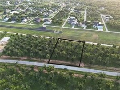 Lot 4011 Experience luxury living at The Landings Airpark near on Pecan Plantation Country Club in Texas - for sale on GolfHomes.com, golf home, golf lot