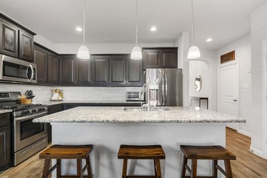 Welcome to this beautifully maintained DR Horton home built in on The Golf Club At Champions Circle in Texas - for sale on GolfHomes.com, golf home, golf lot