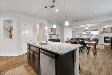 Welcome to this beautifully maintained DR Horton home built in on The Golf Club At Champions Circle in Texas - for sale on GolfHomes.com, golf home, golf lot